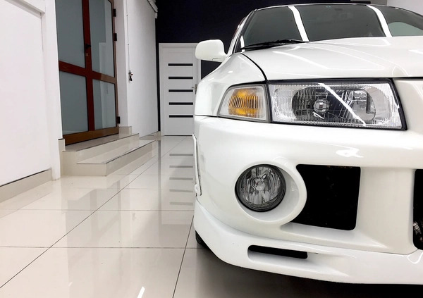 Mitsubishi Lancer Evolution cena 144700 przebieg: 92800, rok produkcji 1999 z Warszawa małe 79